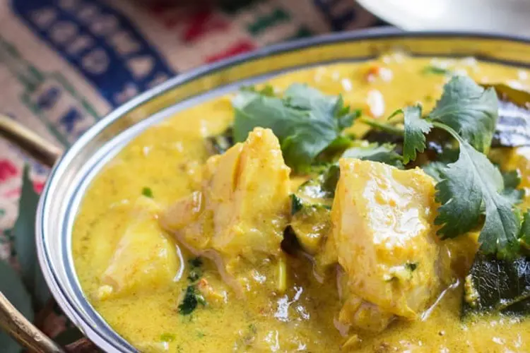 A simple healthy curry recipe, ready in 30 minutes, with tender fish in a bold, spiced sauce.