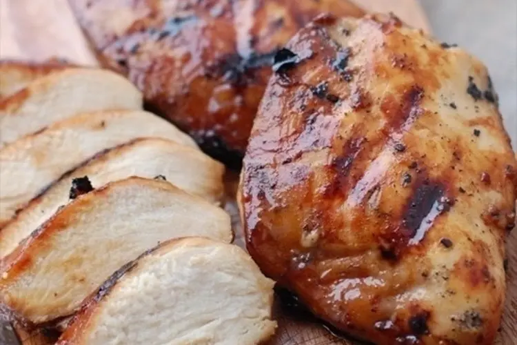 BBQ chicken thighs charred to perfection after soaking in a deeply flavoured bbq marinade with soy, mustard, and vinegar.