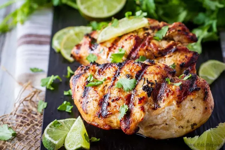 Grilled chicken breasts infused with a Mexican-style barbeque marinade of lime juice, cumin, and garlic