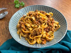 Rich and hearty authentic Bolognese—a classic high-protein beef recipe! Perfect for those seeking high-protein recipes, meal prep, and comforting meals.