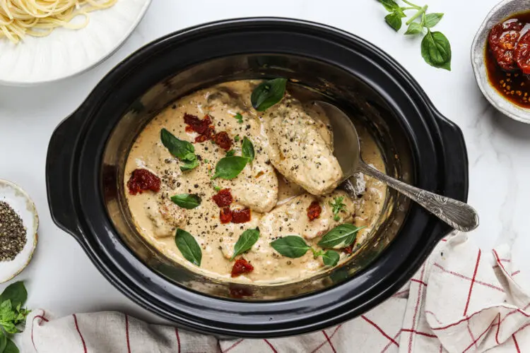 Indulgent and creamy slow cooker Marry Me Chicken—a must-try high-protein chicken recipe! Perfect for high-protein recipes, meal prep, and a stress-free, flavourful dinner.