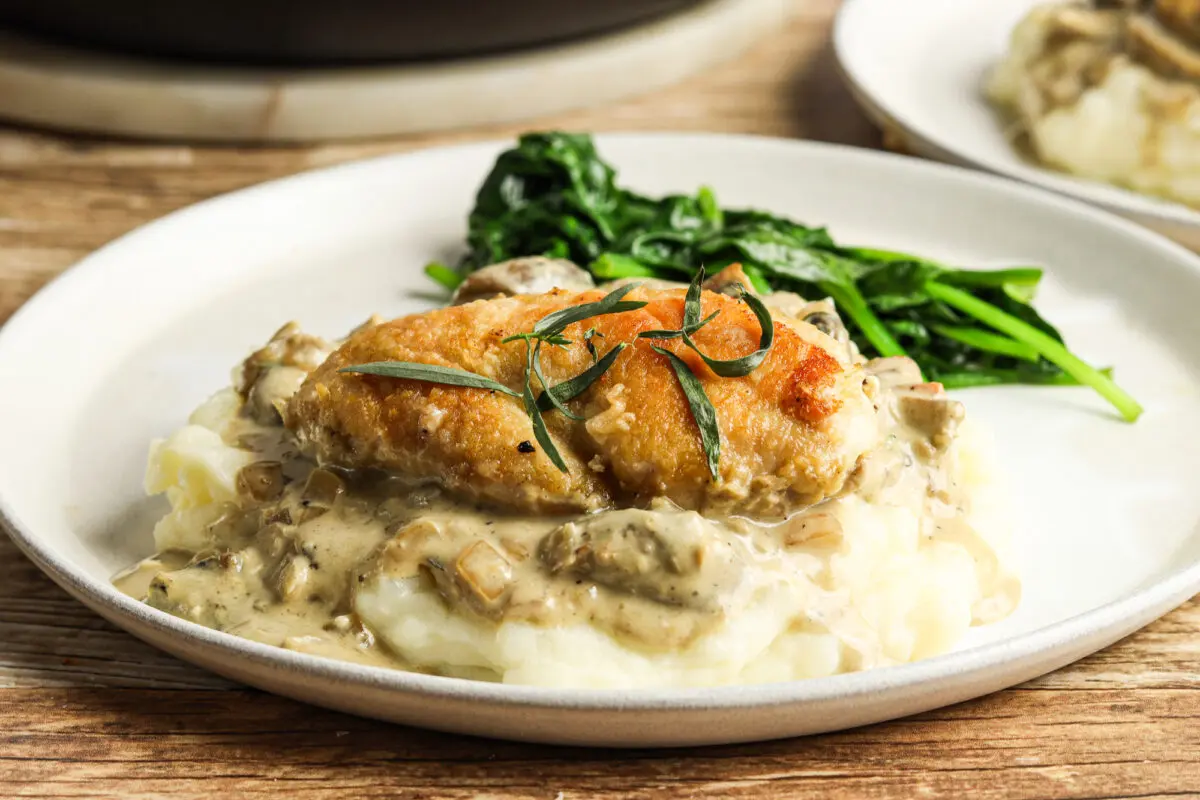 Crispy golden chicken breasts nestled in a thick mushroom and onion cream sauce.