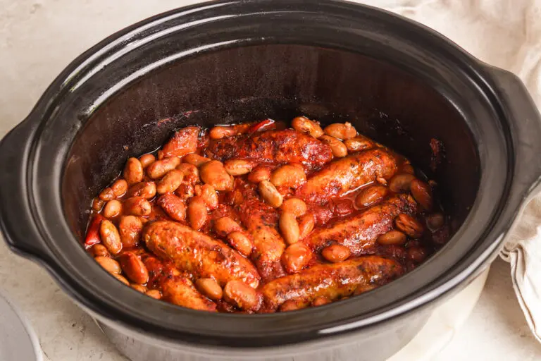 Slow cooker sausage casserole with chicken sausages and butterbeans in a rich tomato sauce