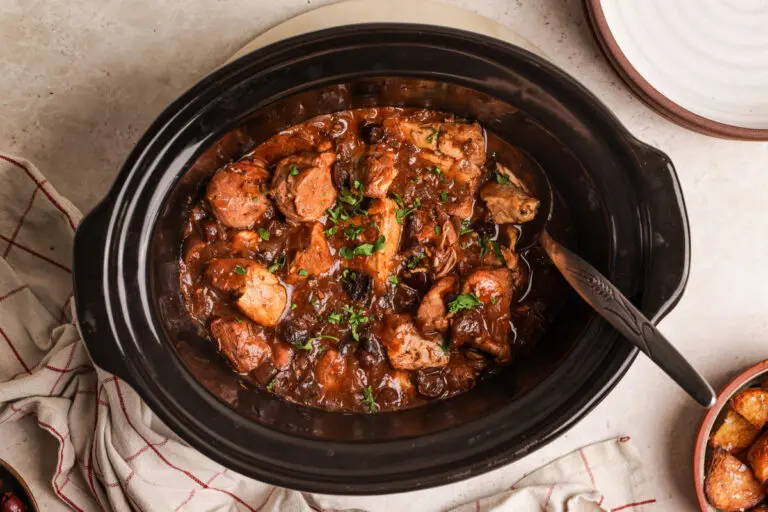 Slow cooker Spanish chicken in rich paprika sauce with olives and parsley