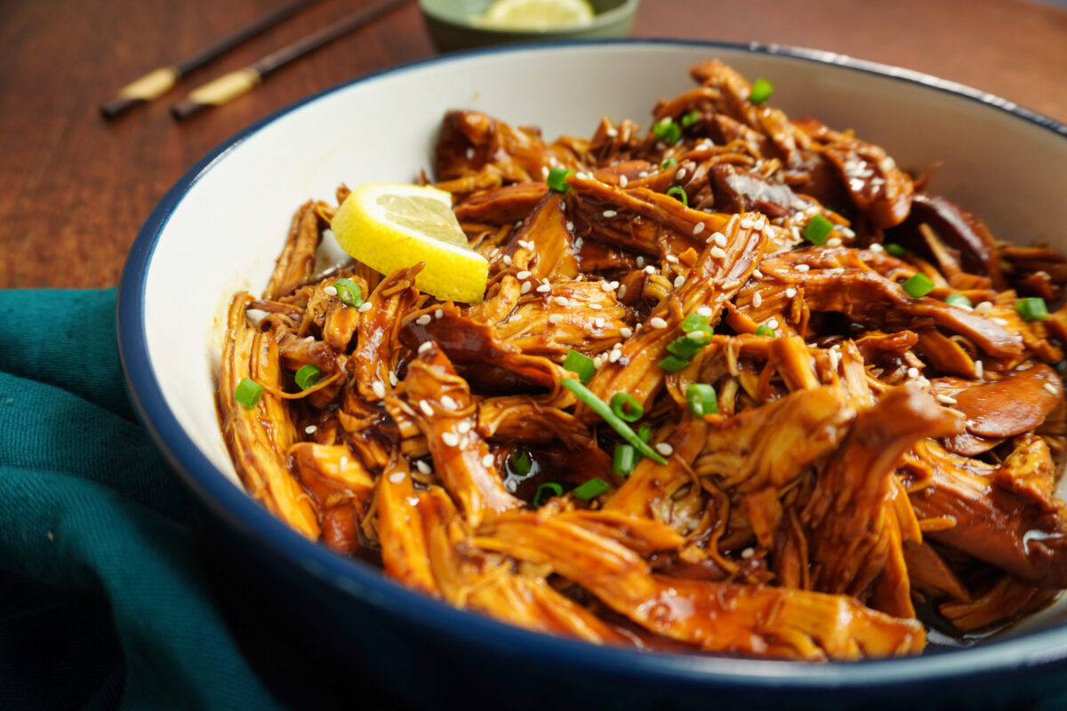 Zesty and tender slow cooker lemon chicken—a light yet satisfying high-protein chicken recipe! Great for high-protein recipes, meal prep, and easy dinners.